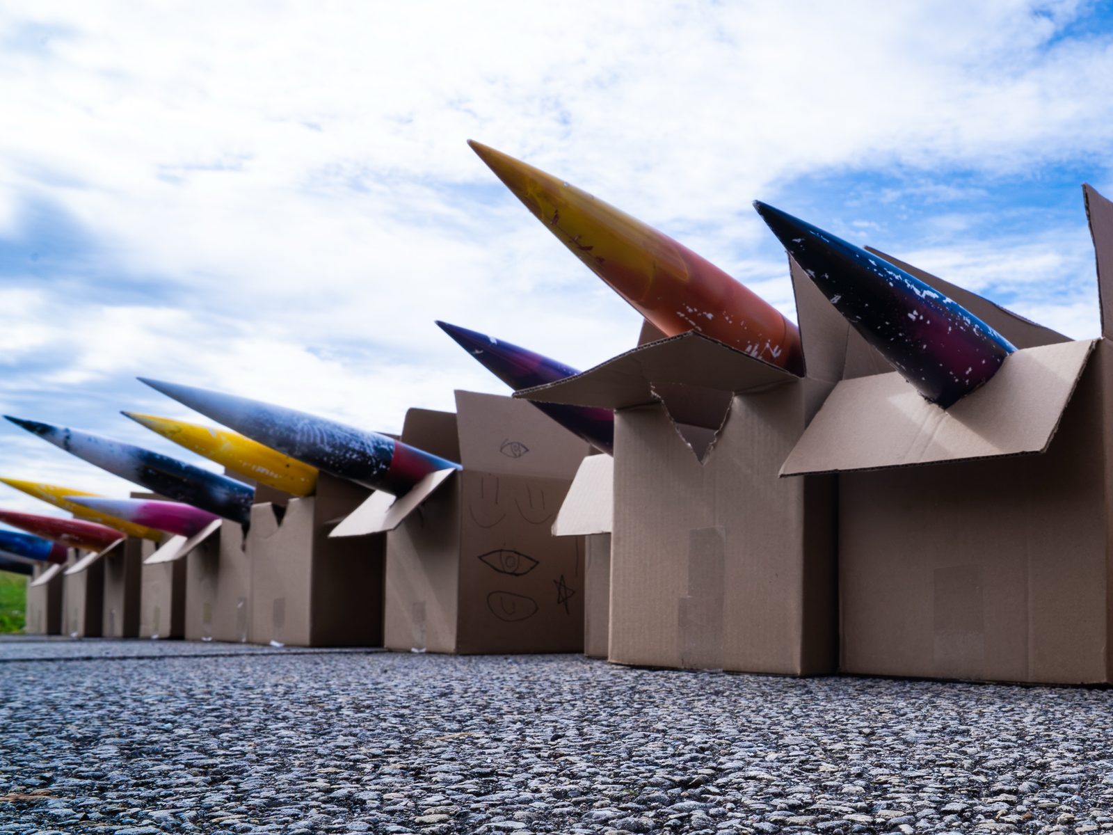 Student rockets waiting in their boxes