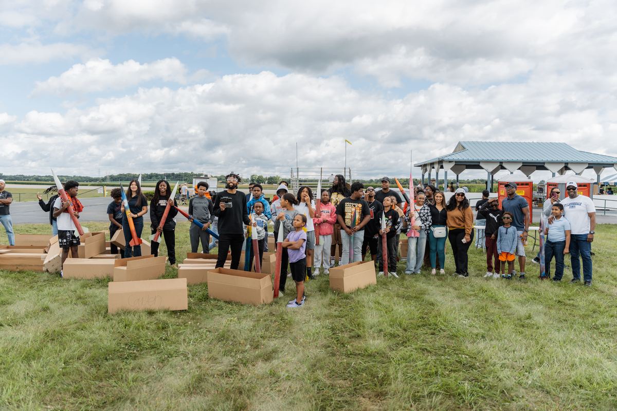 Rocket Bootcamp group photo with rockets